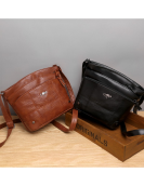 Woman soft leather postman shoulder bag